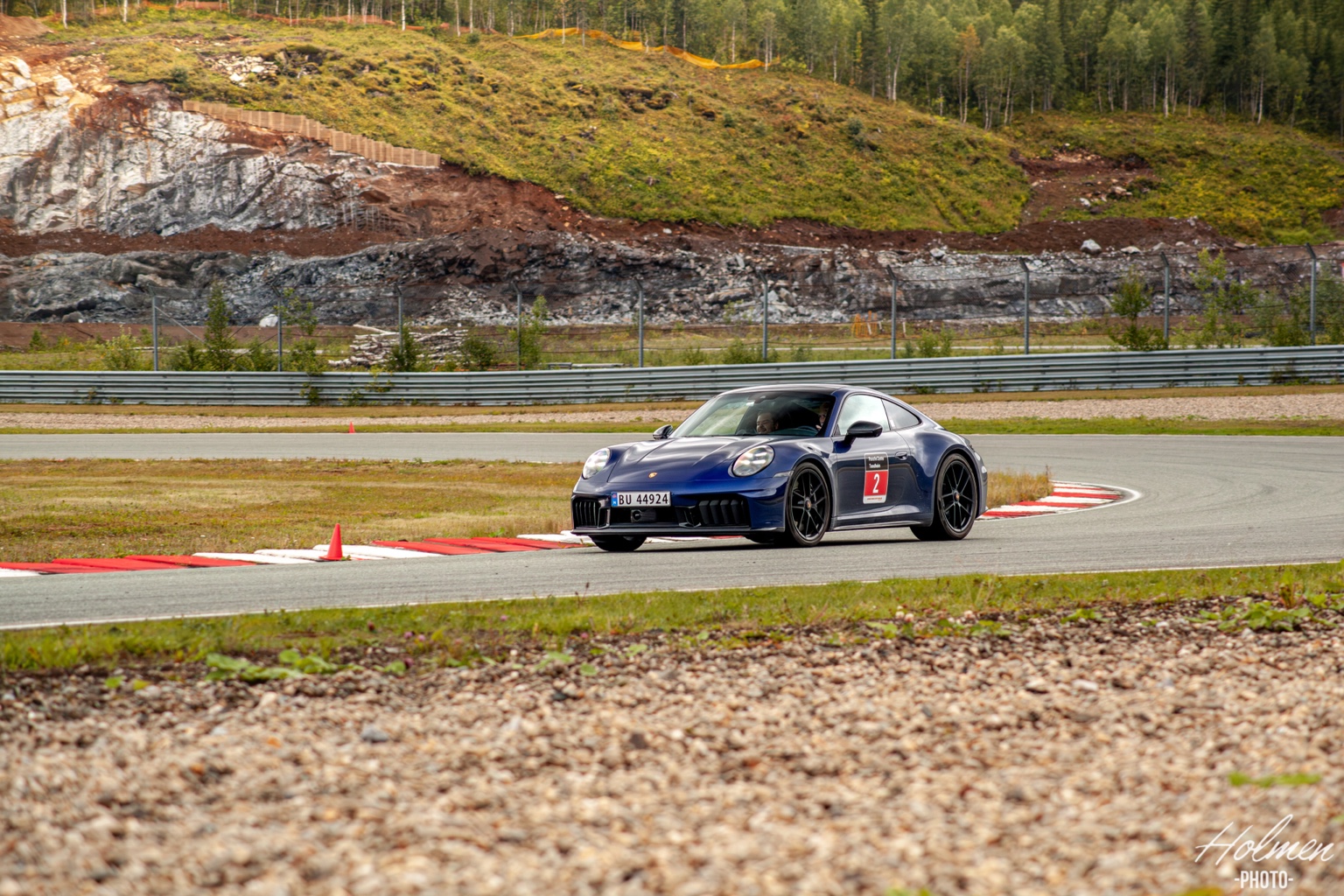 Blå Porsche 911 i sving